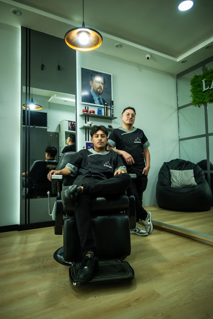Barbershop in Cuenca, Ecuador with stylists and modern interior design.